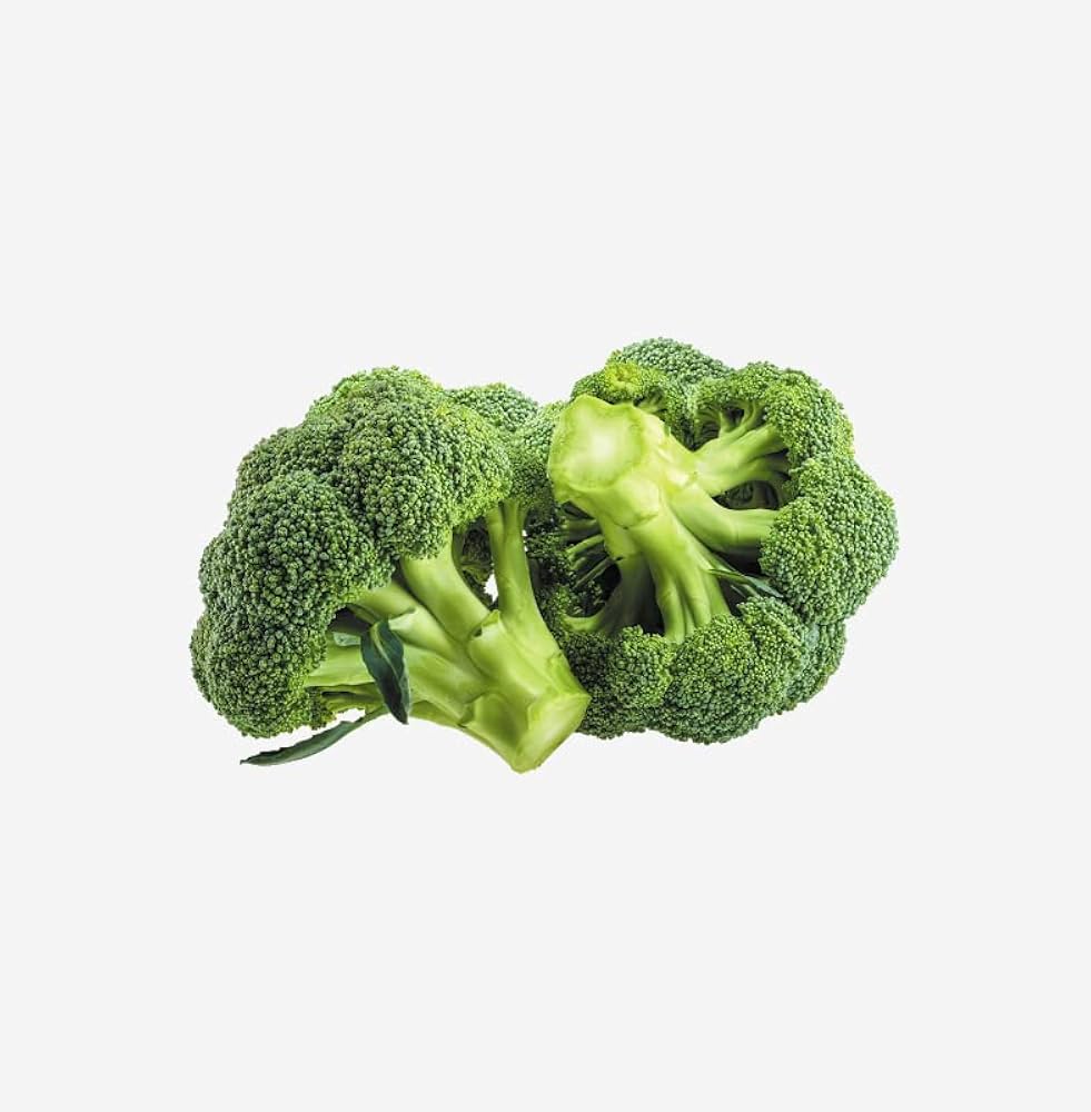 Broccoli heads developing in vegetable patch